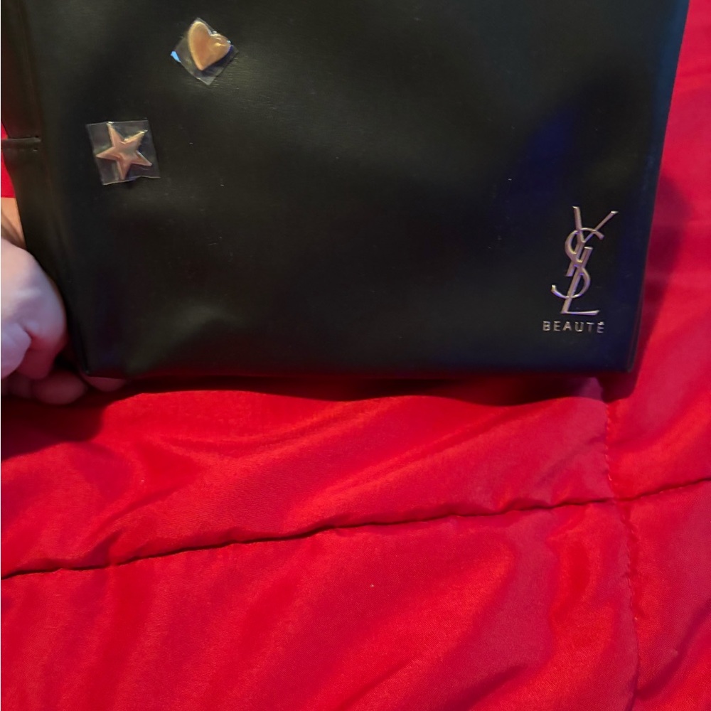 Yves Saint Laurent Black Pouch with Gold Accents